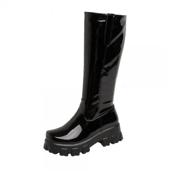 Mid length boots, thick sole, warm and shiny leath...